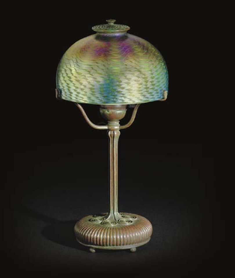 A Favrile Glass And Bronze Table Lamp by Tiffany Studios