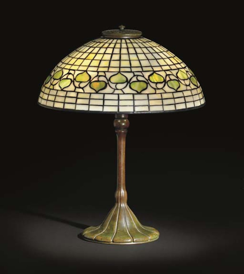 A 'Leaf And Vine' Leaded Glass And Bronze Table Lamp by Tiffany Studios