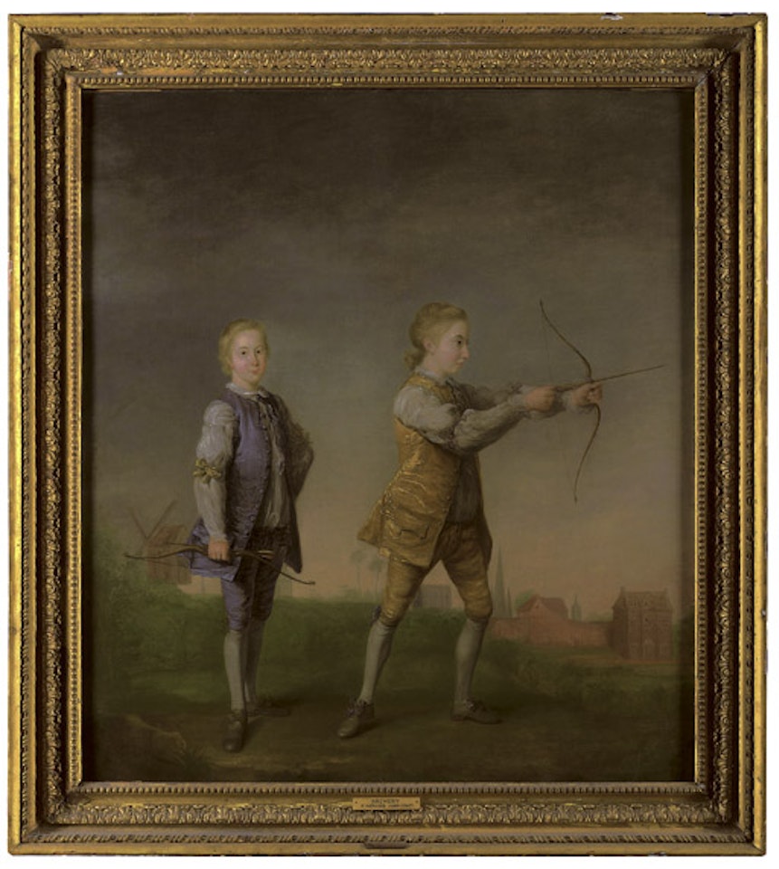 Portrait of two boys practising archery outside Norwich, Castle and CaL14thedral beyond by English School