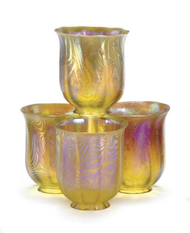A Group Of Four Favrile Glass Shades by Tiffany Studios