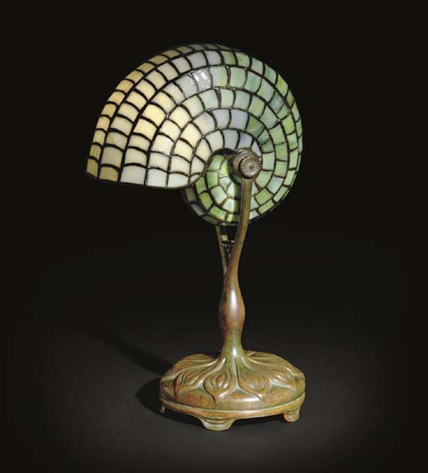A Leaded Glass And Bronze 'Nautilus' Table Lamp by Tiffany Studios