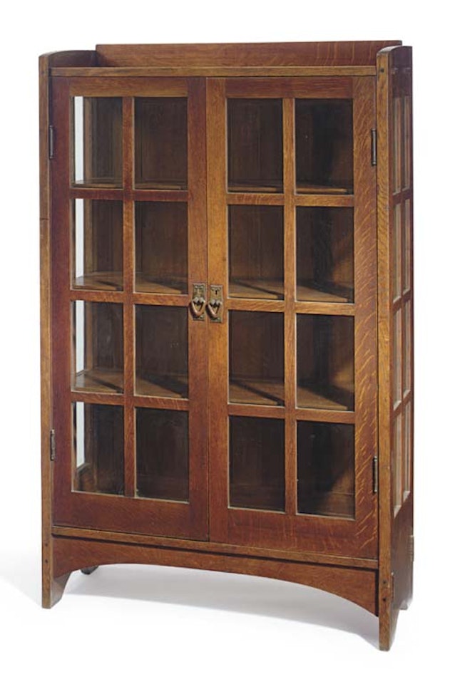 An Oak And Glass China Cabinet by Gustav Stickley