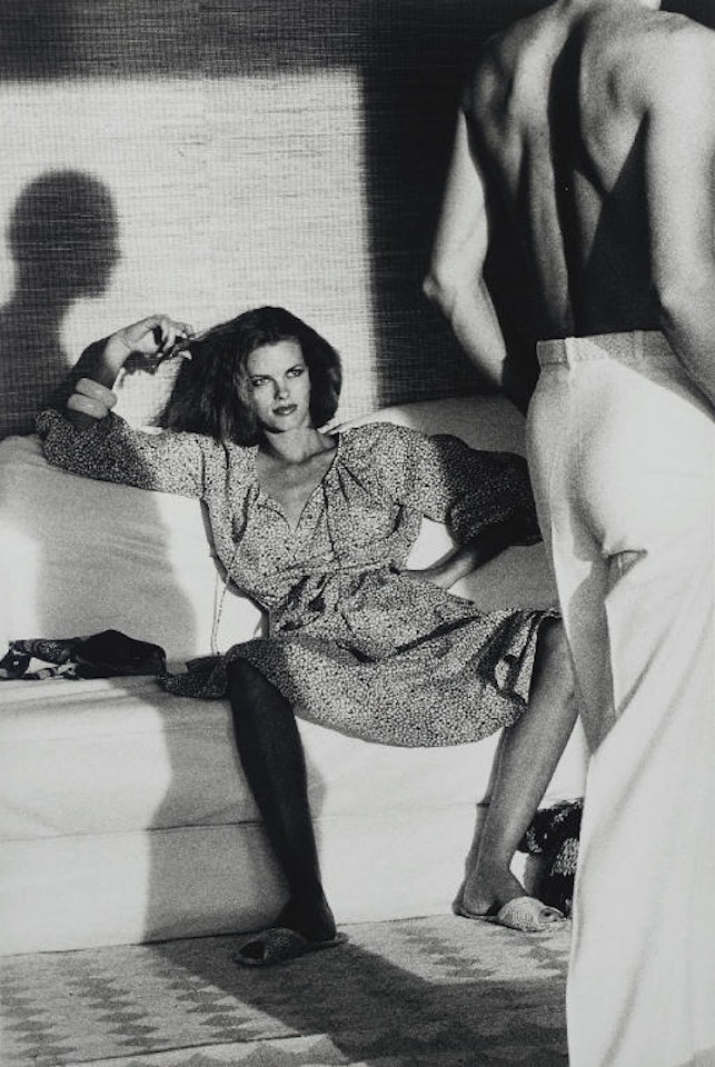 Woman Examining Man, St. Tropez, 1975 by Helmut Newton