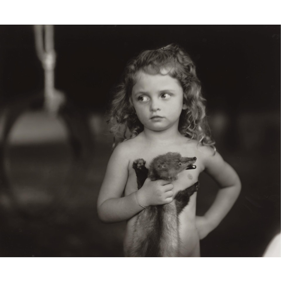 Holding The Weasel by Sally Mann