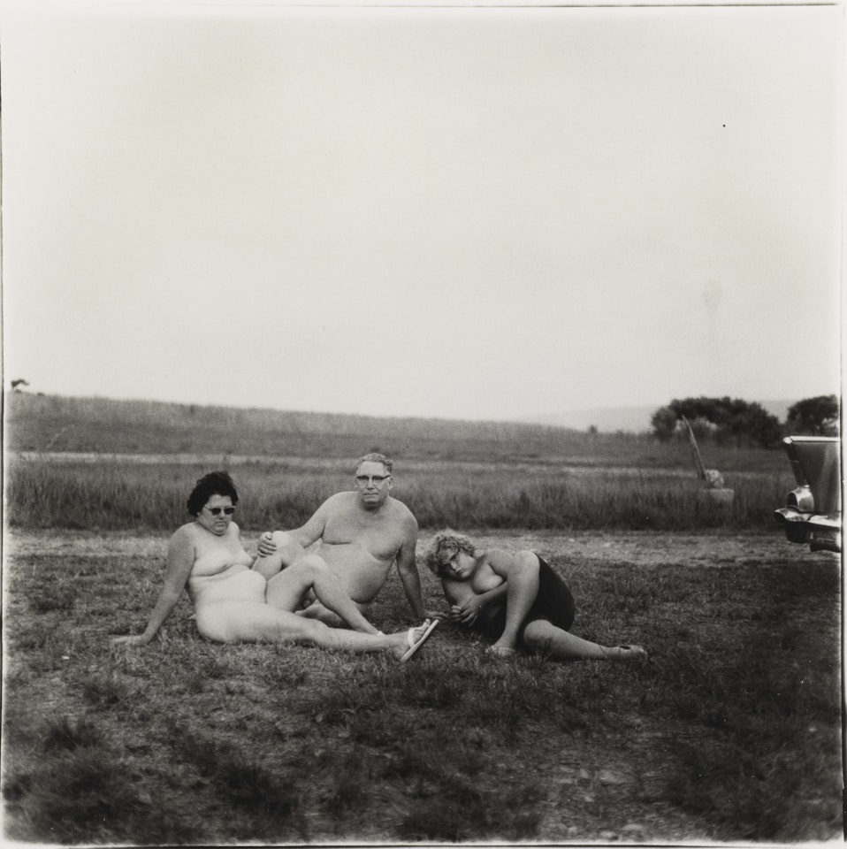 A FAMILY ONE EVENING IN A NUDIST CAMP by Diane Arbus