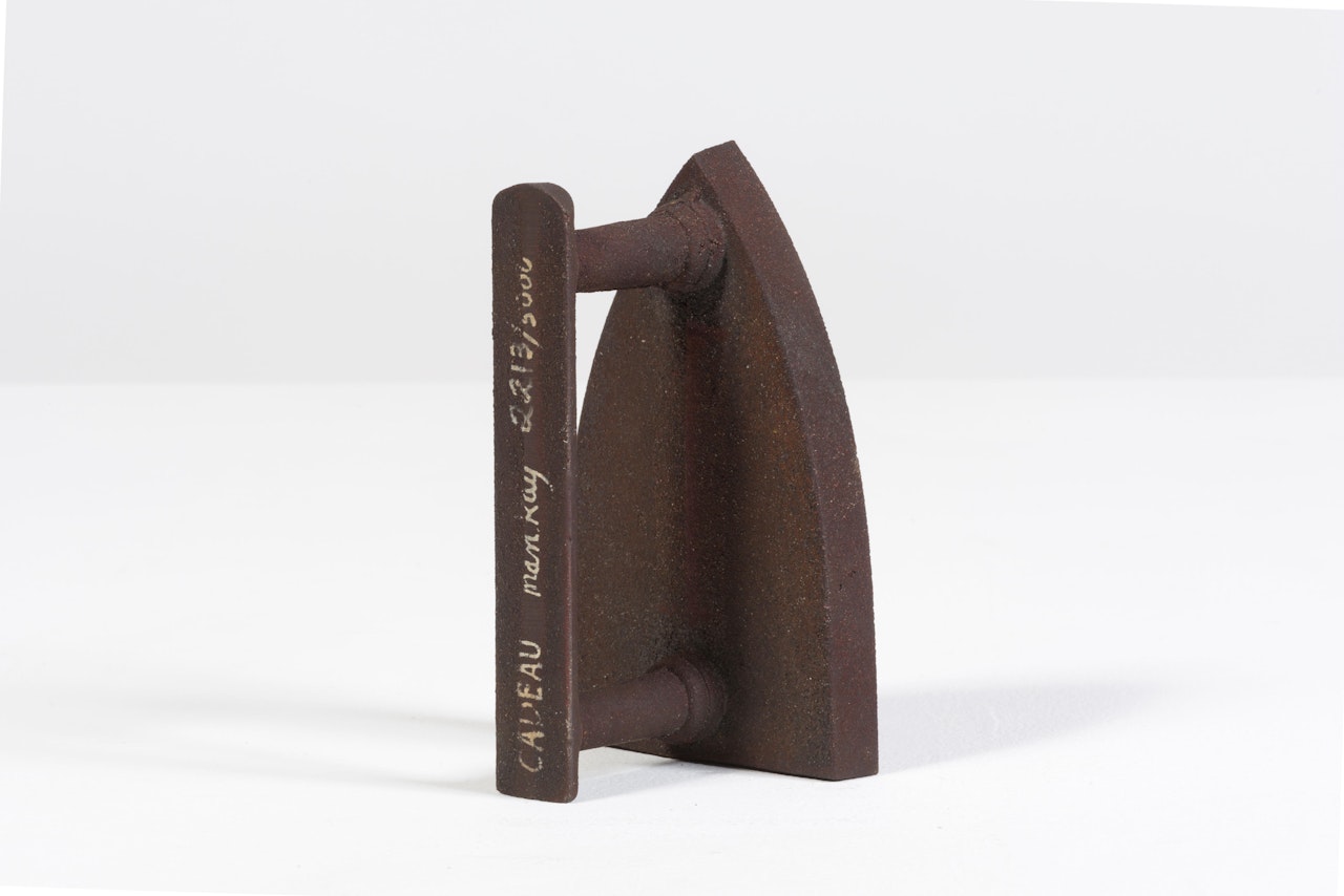 Le cadeau, by Man Ray