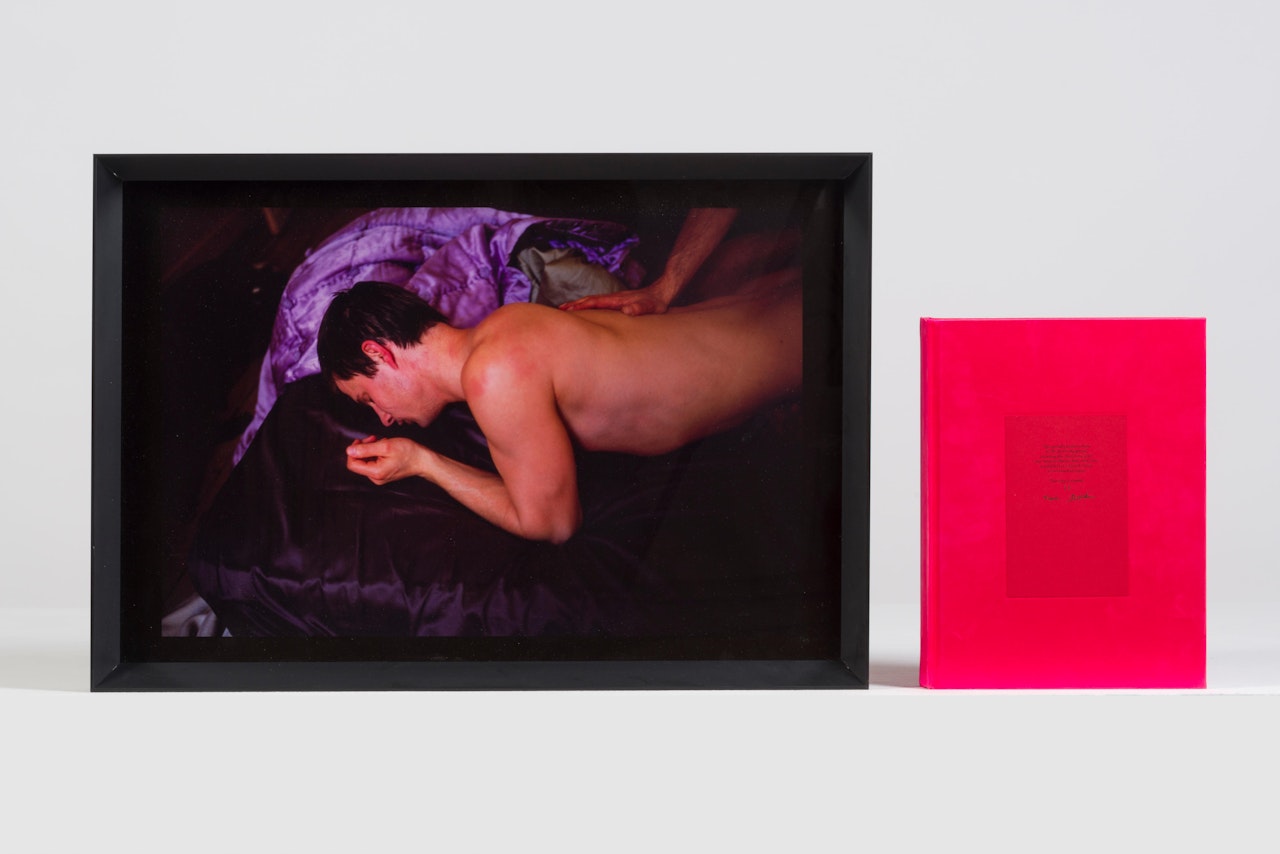 Jens' hand on Clemens' back, Paris by Nan Goldin