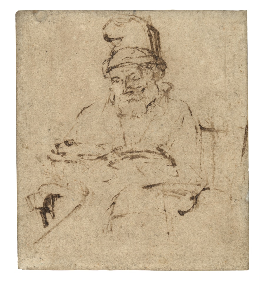 A seated old man reading by Attributed to Rembrandt Harmensz van Rijn