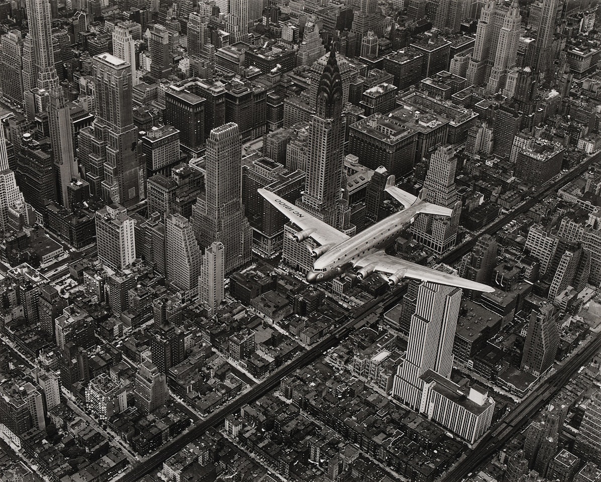 DC-4 Flying Over New York City by Margaret Bourke-White