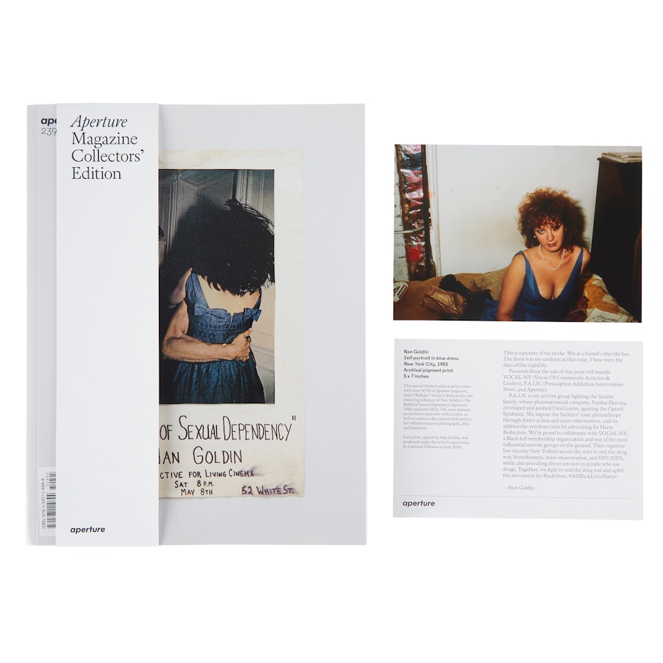 SELF-PORTRAIT IN BLUE DRESS, NEW YORK CITY by Nan Goldin