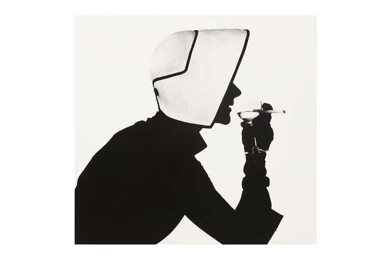 WOMAN IN DIOR HAT WITH MARTINI (LISA FONSSAGRIVES-PENN) by Irving Penn