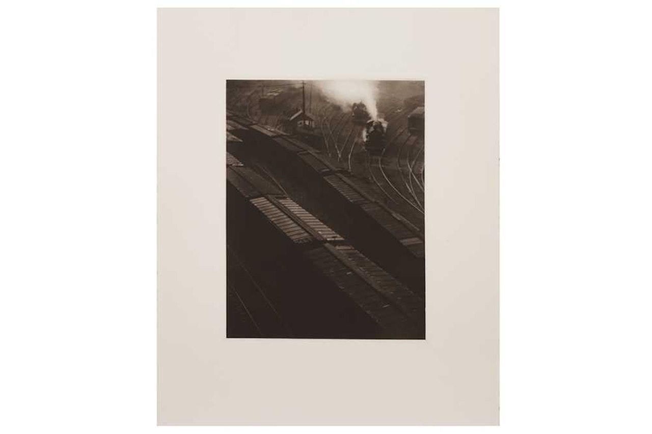 TRAIN TRACKS/NEW YORK BUILDINGS by Paul Strand
