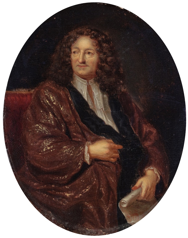 Portrait of a gentleman, seated, in a burgundy robe de chambre, holding a parchment scroll by French School
