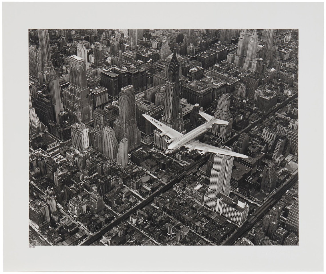 "A DC-4 flying over New York City,"; later impression by Margaret Bourke-White