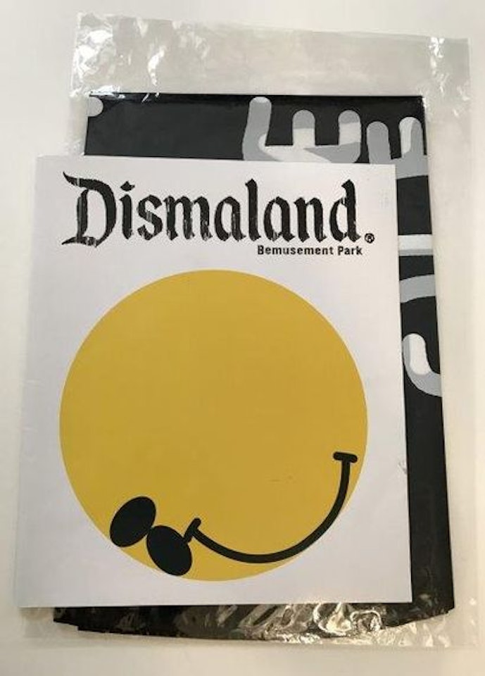 Dismaland program and balloon in a blister by Banksy