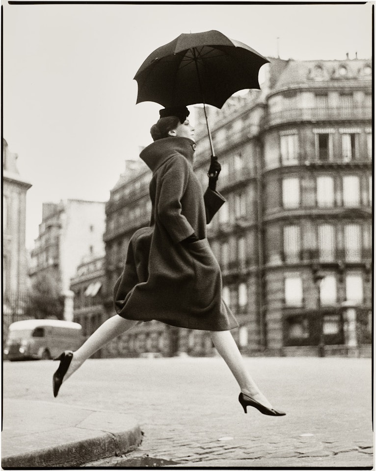 Carmen, Homage to Munkácsi, Coat by Cardin, Place François-Premier, Paris, August by Richard Avedon