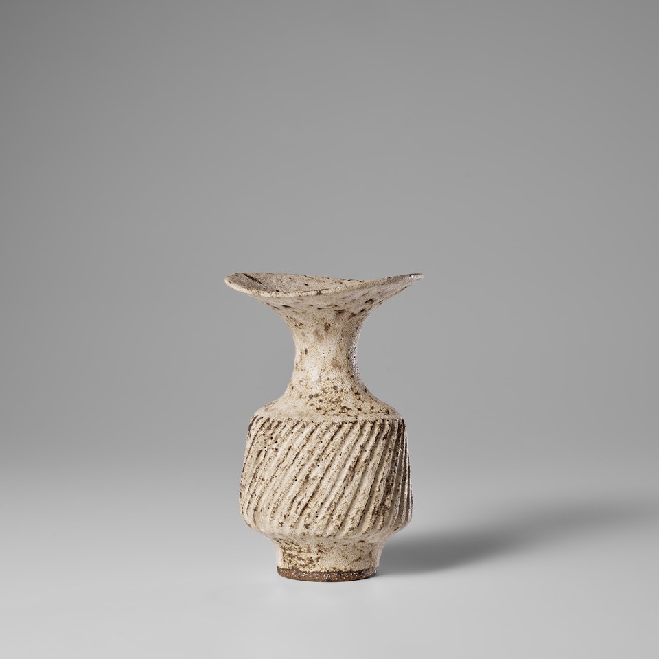 Vase with fluted body and flaring lip by Lucie Rie