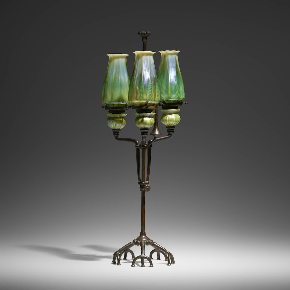 Rare adjustable candleholder with snuffer by Tiffany Studios