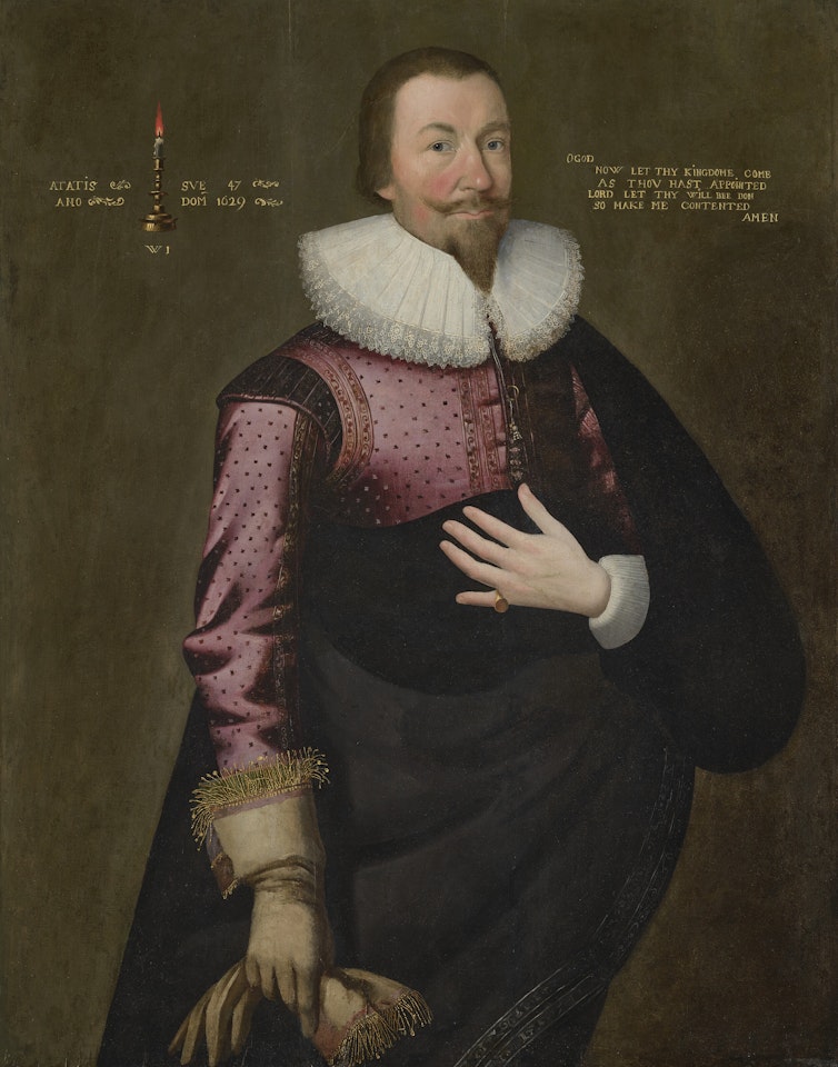 Portrait of a gentleman, three-quarter-length, in a black cloak, embroidered burgundy jacket and white ruff by English School