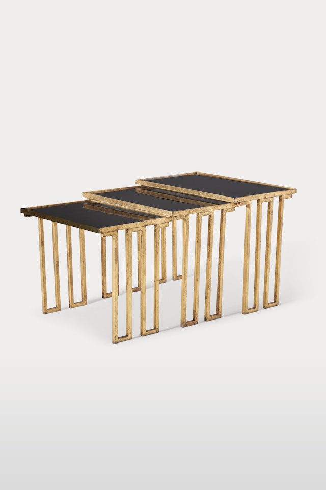 SET OF THREE 'CRÉNEAUX' NESTING TABLES, CIRCA by Jean Royere