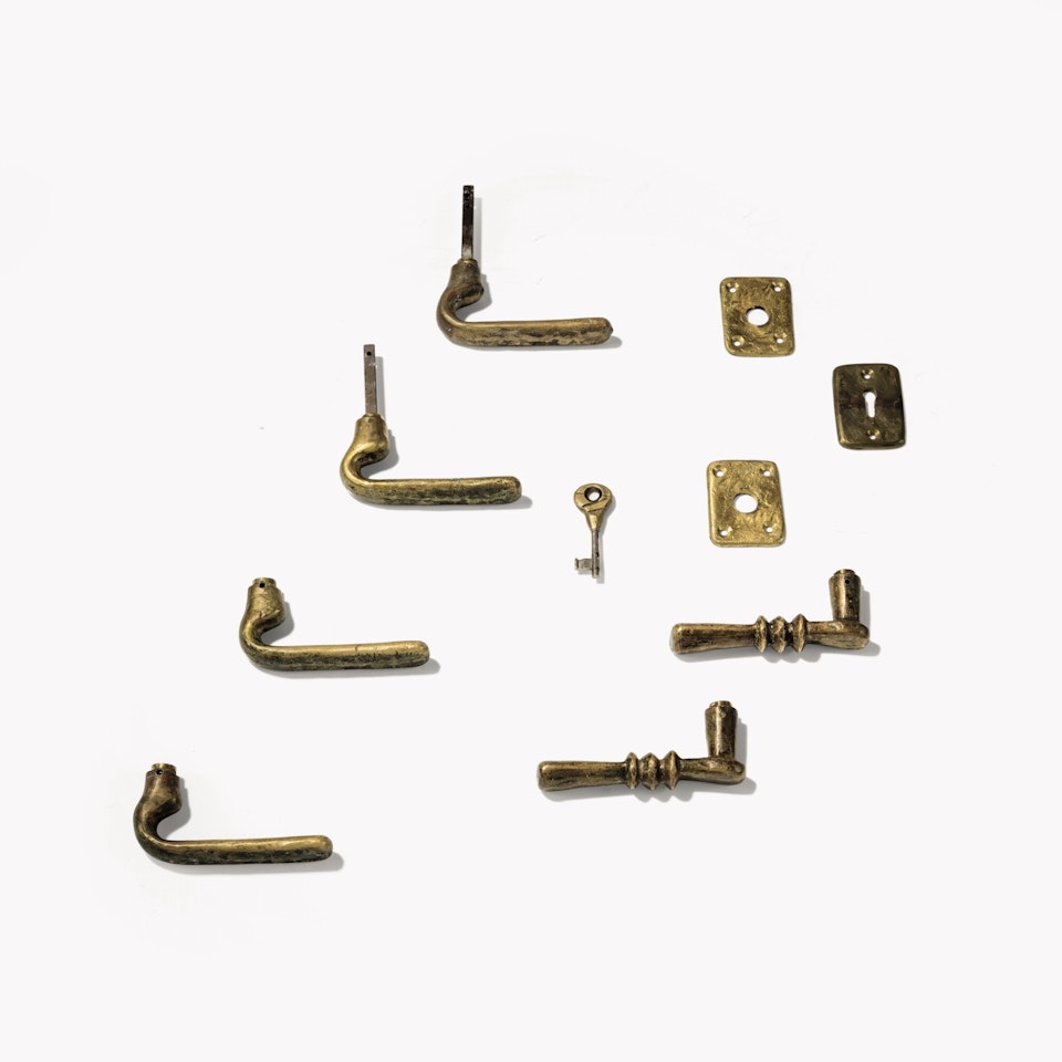 Three pairs of door handles, three escutcheons with one key by Diego Giacometti