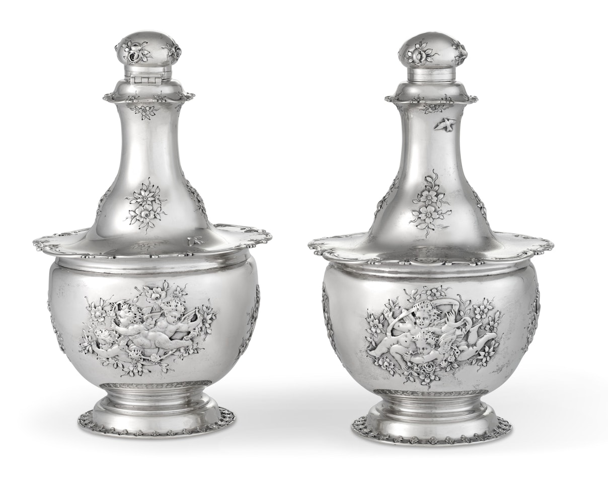 A PAIR OF AMERICAN SILVER PERFUME FLASKS by Tiffany & Co.
