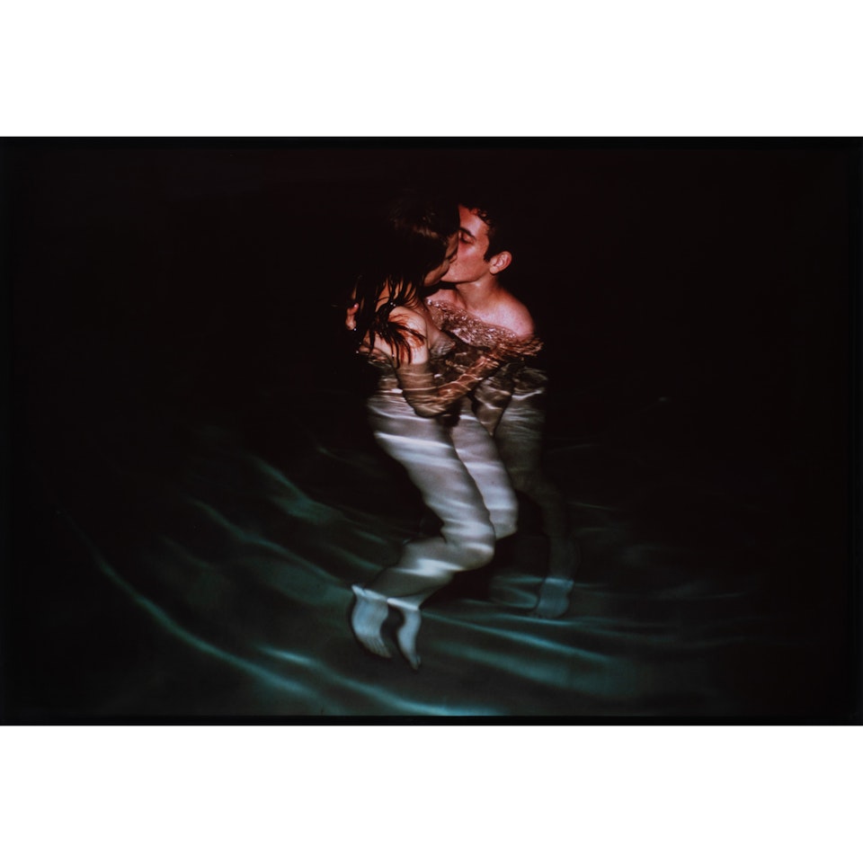 Simon and Jessica kissing in Yvon"s pool, Avignon by Nan Goldin