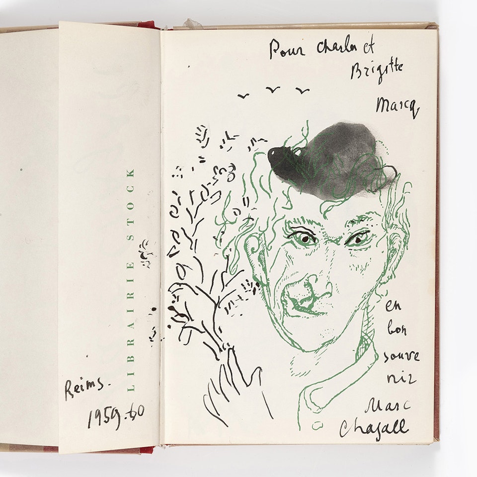 Self-portrait with a grimace in a black hat by Marc Chagall
