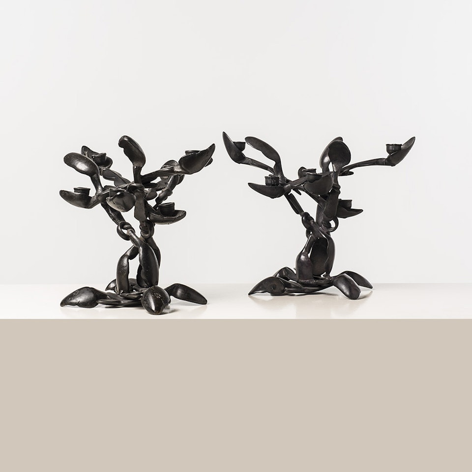 Candlesticks known as African spoons by Arman