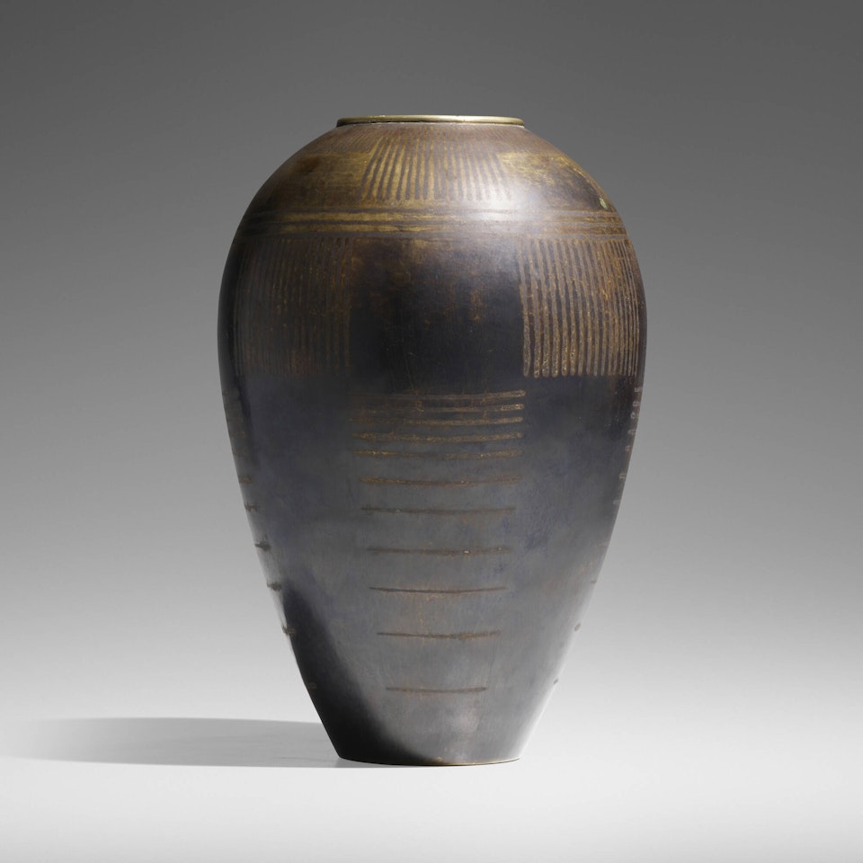 Dinanderie vase by Jean Dunand