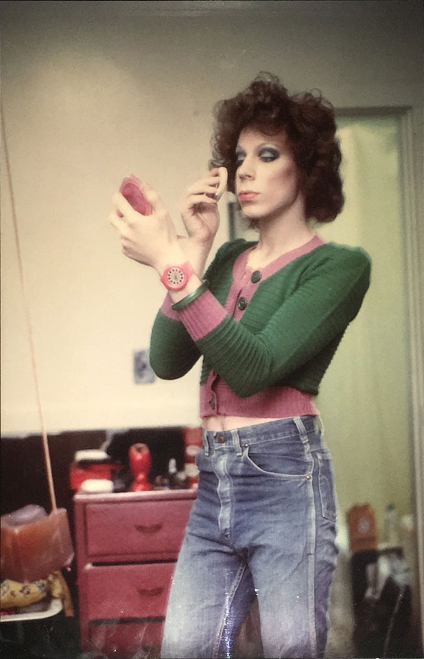 Kenny Putting on Makeup, Boston by Nan Goldin