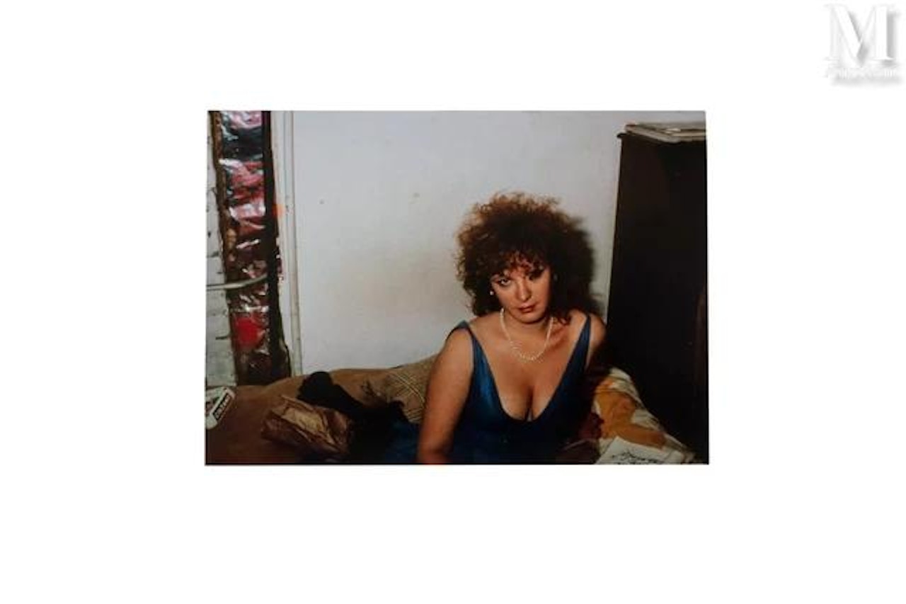 Self-portrait in blue dress, New York City by Nan Goldin