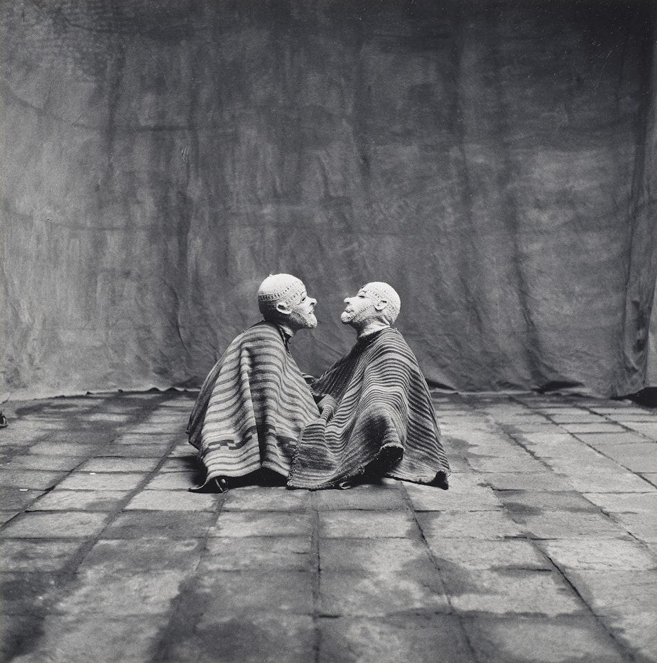 Two Men in White Masks, Cuzco, Peru by Irving Penn