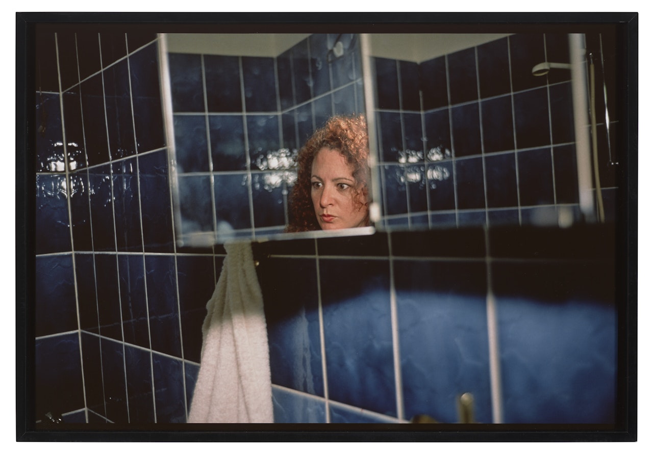 Self-portrait in my blue bathroom, Berlin by Nan Goldin