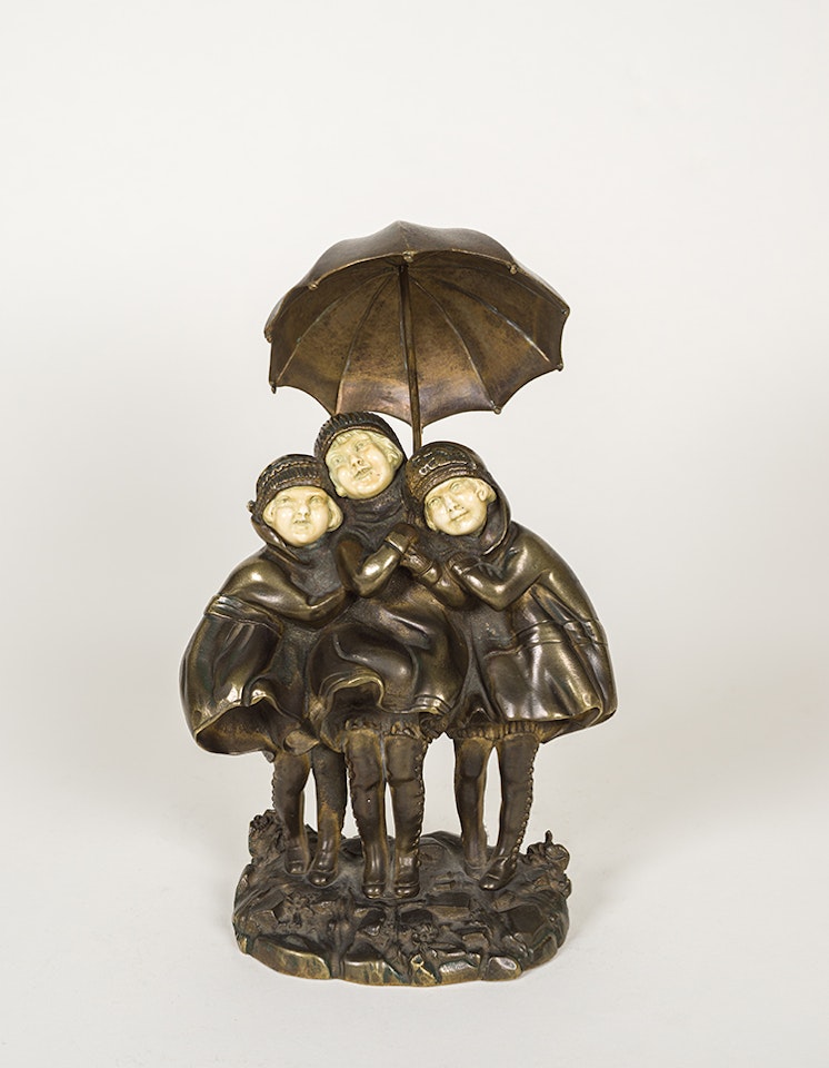 Three Children with Umbrella by Demetre Chiparus