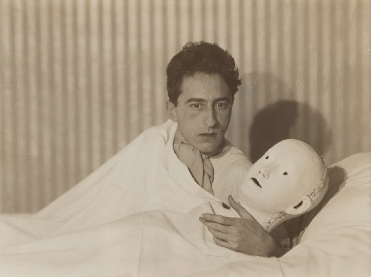 Jean Cocteau with Mask by Berenice Abbott