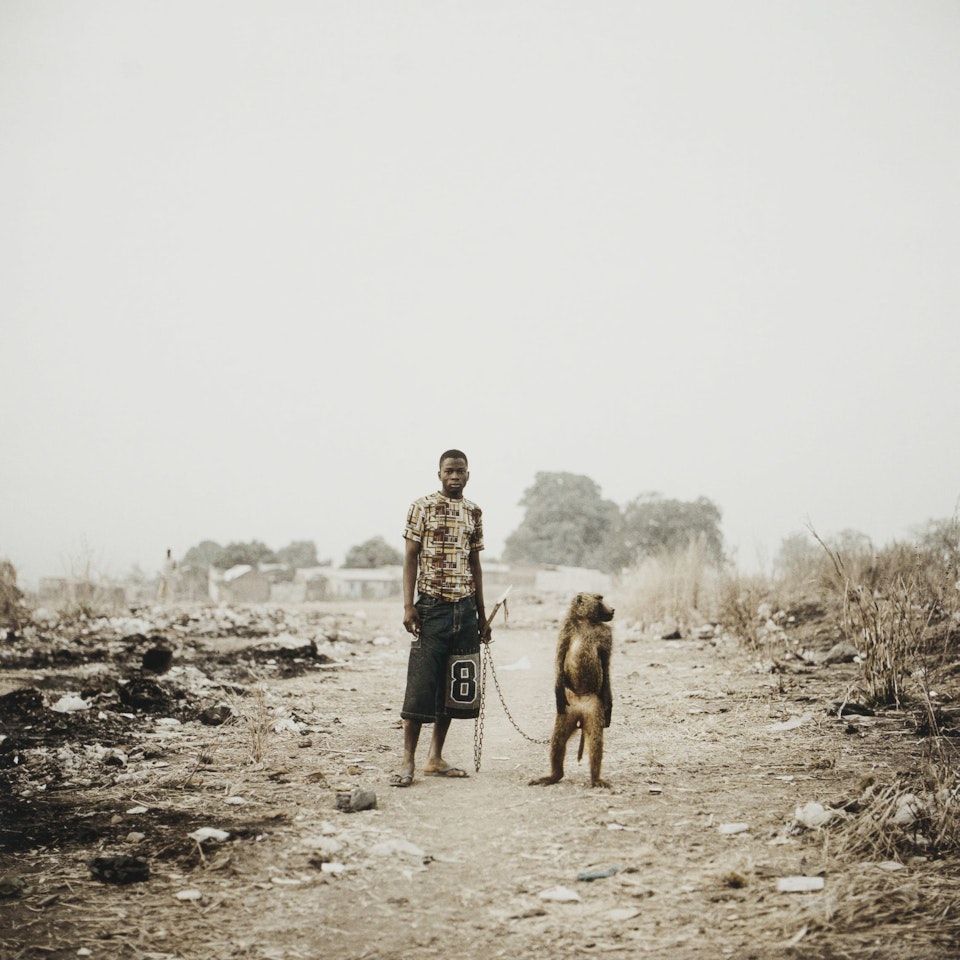 Mallam Umaru Ahmadu with Amita, Abuja, Nigeria, The Hyena Men Series by Pieter Hugo