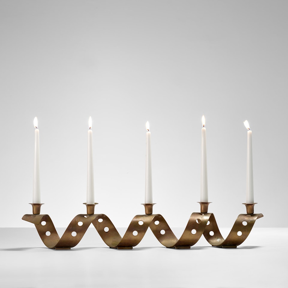 "Perforation" candle holder by Jean Royere