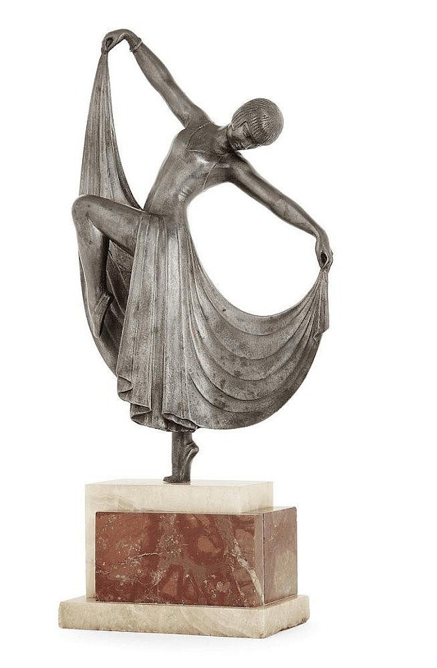 A regulus sculpture with silver patina shaping a dancer in Art déco style by Demetre Chiparus