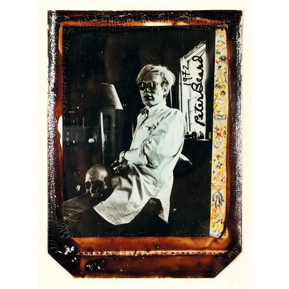 ANDY WARHOL AT HOME WITH SKULL by Peter Beard