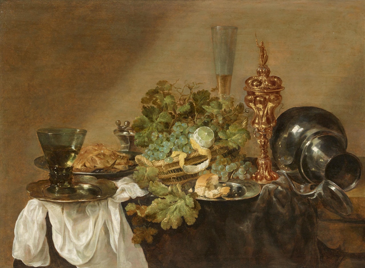 A Still Life with Grapes, Lemons, Bread, a Rummer and a gilded Chalice on a Table by Abraham van Beijeren
