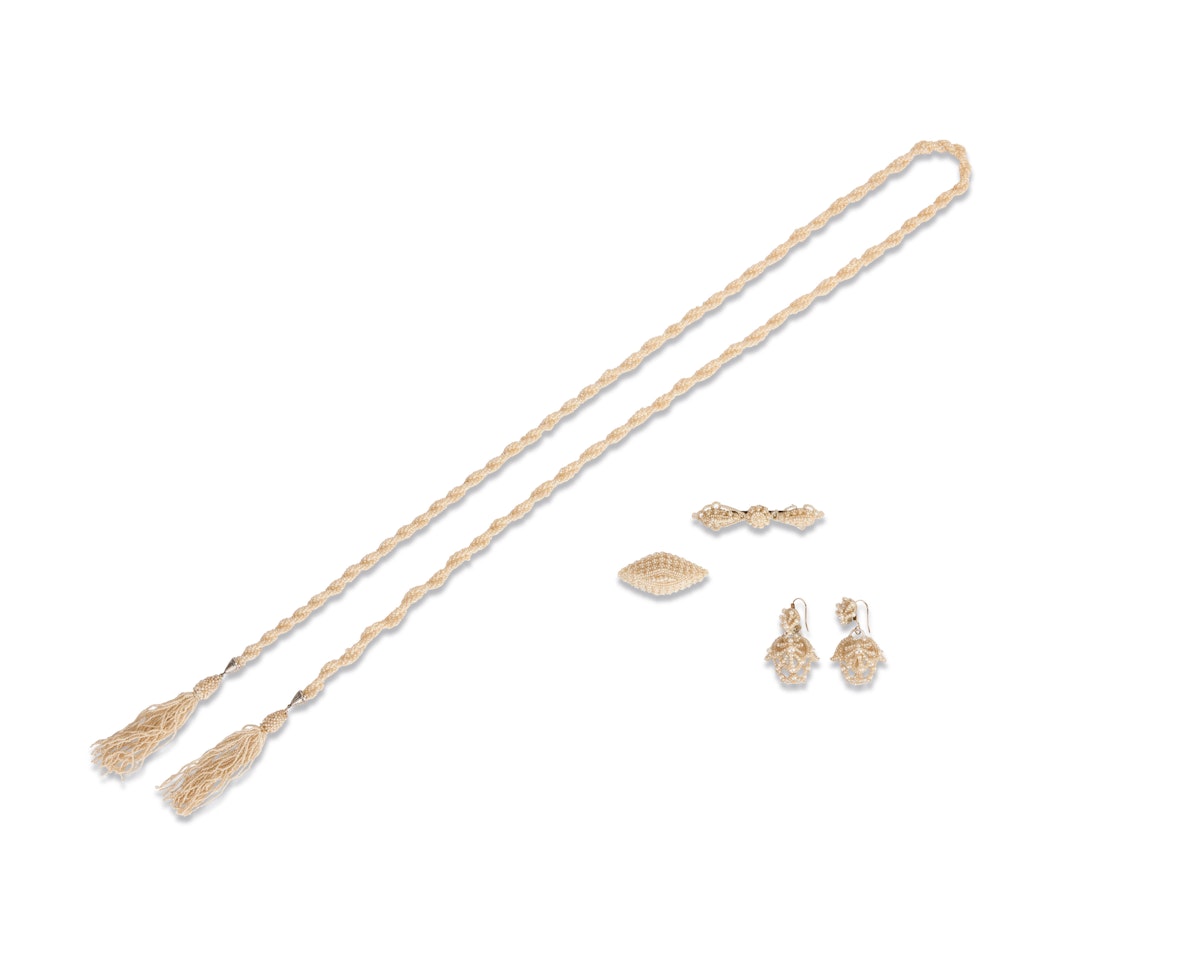 A seed pearl sautoir, a pair of earrings and two brooches by Unknown Jewelry Maker
