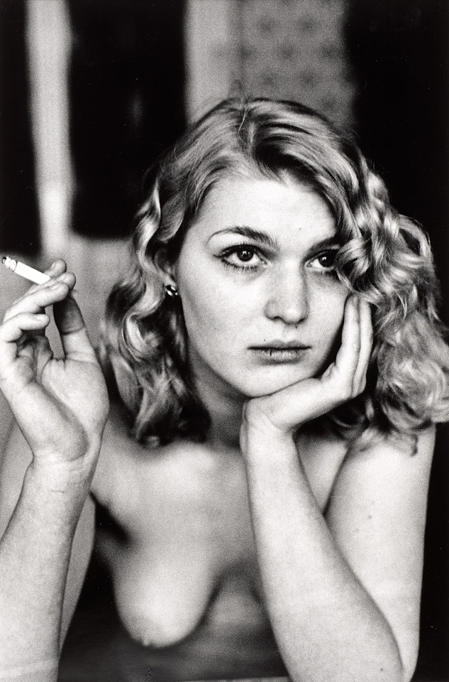 Young Berlin Girl Smoking Cigarette by Helmut Newton