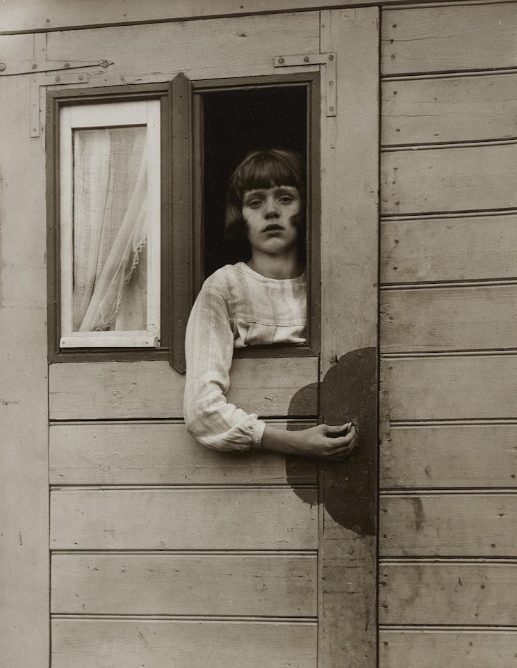 Girl in Fairground Caravan by August Sander