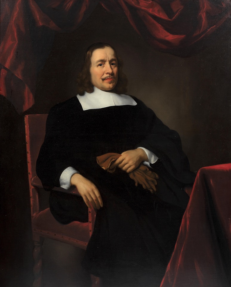 Portrait of a gentleman, three-quarter-length, seated in a chair, before a red curtain by Nicolaes Maes
