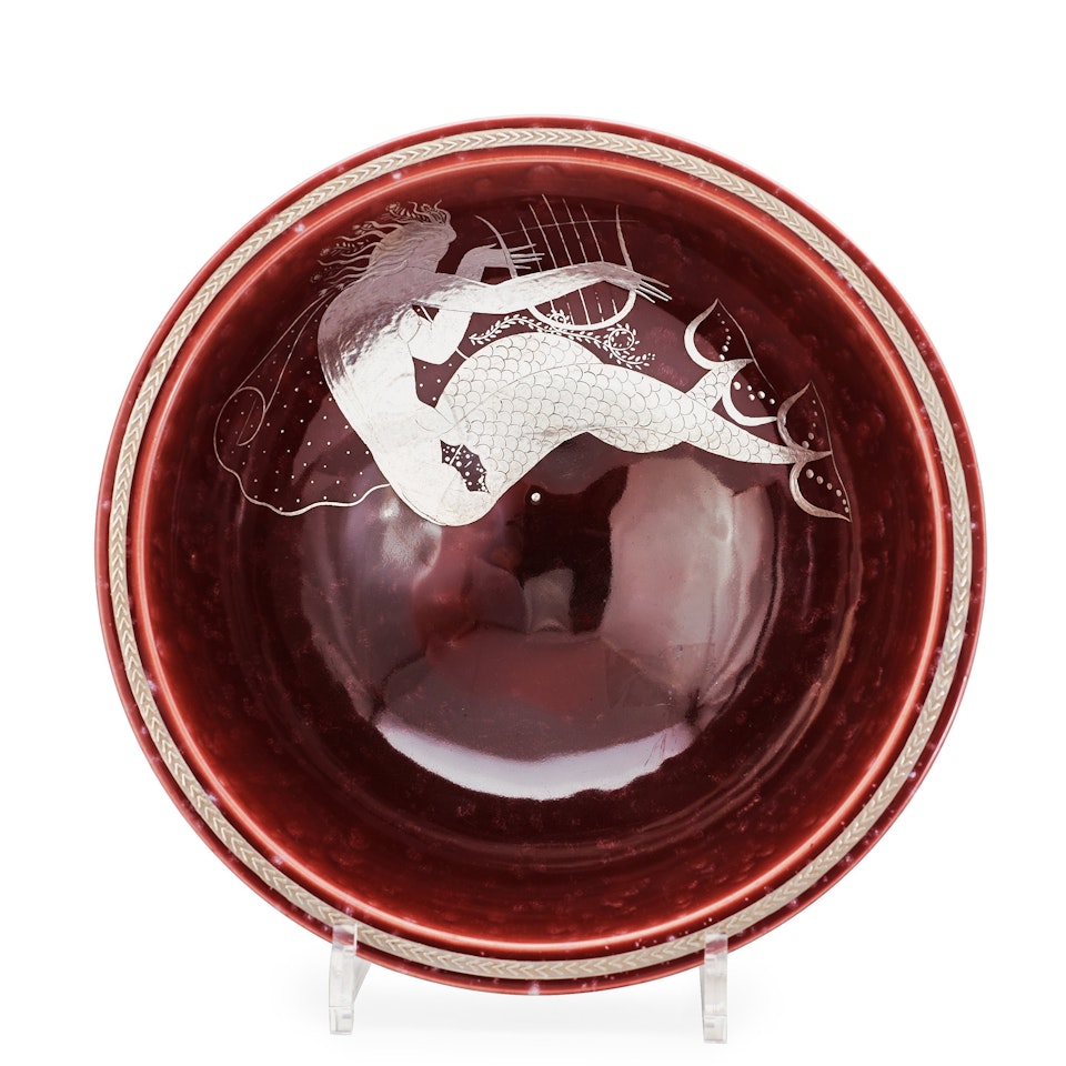 A Wilhelm Kåge red "Argenta" stoneware bowl by Wilhelm Kage