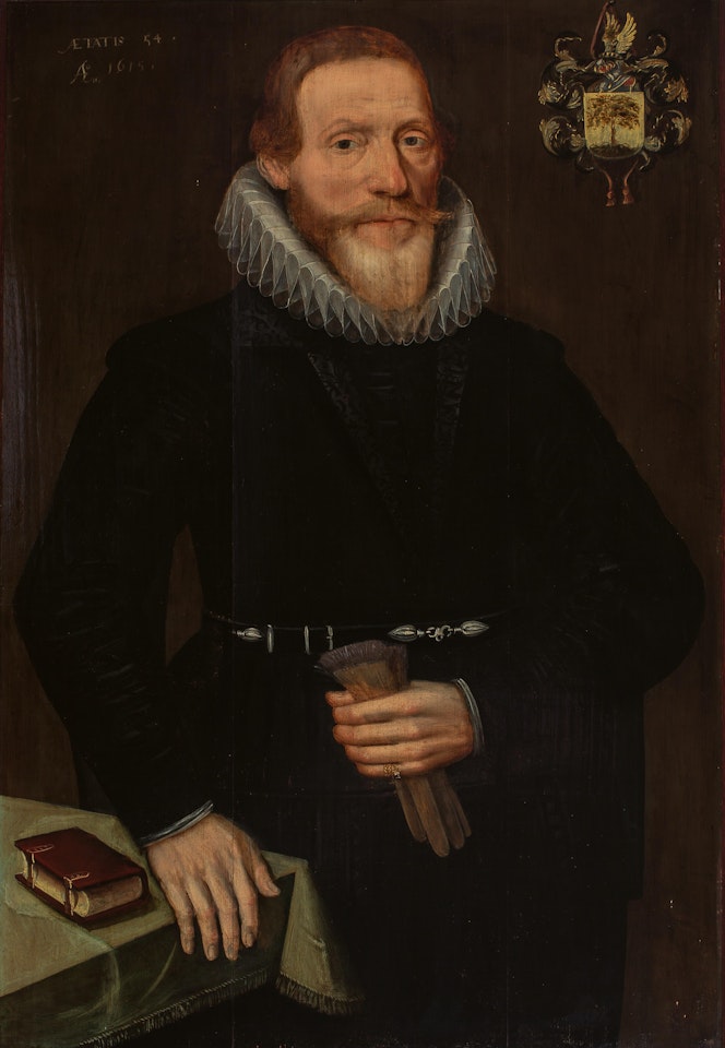 Portrait of a gentleman wearing a mill-stone collar, holding a glove by Dutch School