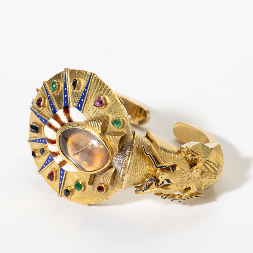 An 18k gold and gem-set watch/bangle by Salvador Dali