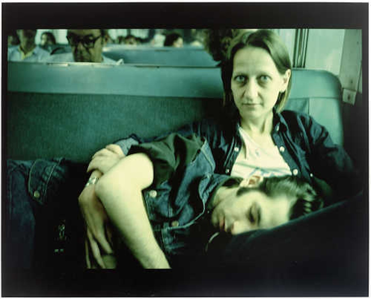"Suzanne and Philippe on the Train. Long Island, 1985" by Nan Goldin