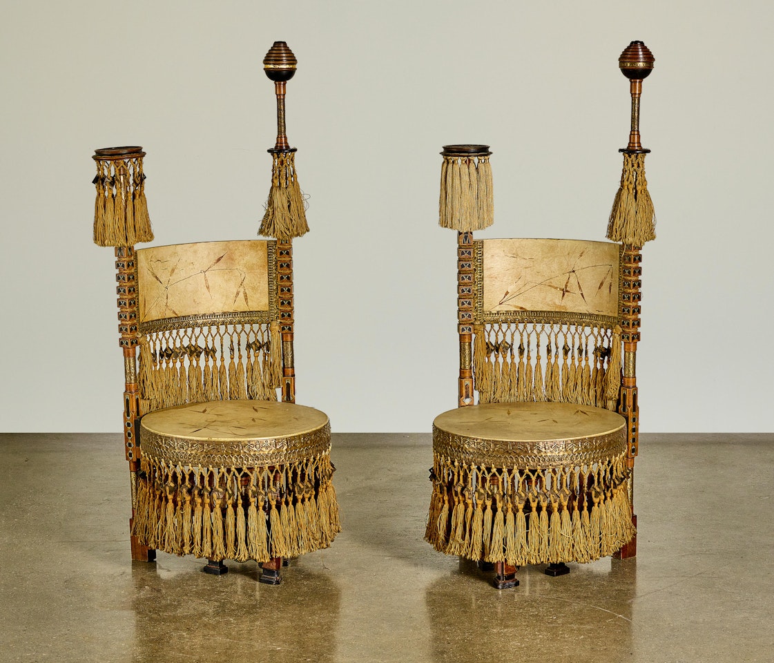 Two Circular Low Chairs by Carlo Bugatti